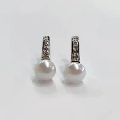 Срібні сережки з перлами та фіанітами — срібна прикраса